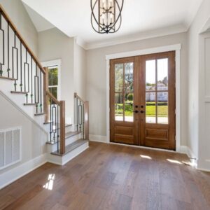 van-isle-windows-french-doors A set of French Doors in wood with four window panes on each door.